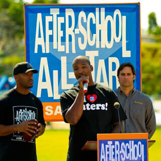 Man giving Speech at Event