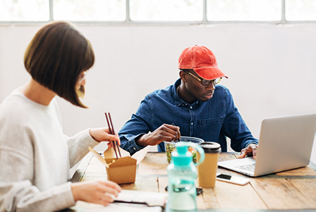 People eating lunch and conducting business